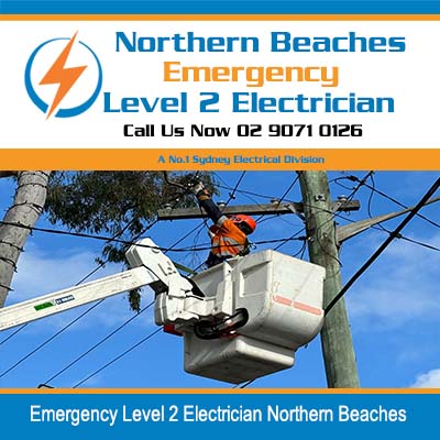 Worker in picker fixing power lines in Northern Beaches
